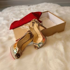 Almost new Louboutin - no 2 pairs alike